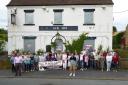 Villagers in Skelton-on-Ure celebrate taking ownership of the Black Lion pub