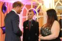 FLASH BACK: Kieran Maxwell chats to Prince Harry at the 2015 WellChild Awards in London, watched by mother Nicola.