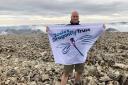 FUNDRAISER: Christopher Tait at the top of Ben Nevis