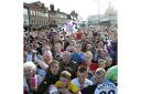Thousands of fans gather in Darlington's market square to celebrate with players after their victory at Wembley in the FA Trophy