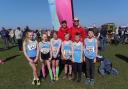 National Primary Schools Cross Country Championships. Back Row from left Head Coach Glen Hilton and Coach Andy Throup, Front Row from left Georgia Raw, Connie Wilford, Isabelle Smith, Jake Holmes, James Throup and Wilf Lamb