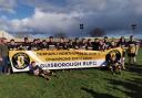 Guisborough with their celebratory banner at the conclusion of the game