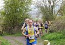 Robert Sparkes from Beverley, no. 410, leading the field just after the start entering Guisborough Woods