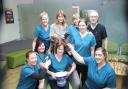 Sarah Robinson, who is to have her head shaved, with colleagues at Leyburn Dental Practice