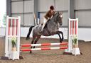Caitlin Gill, 13, with her pony, San Bernadino, qualifying for the Horse of the Year Show. Picture: SMR Photos