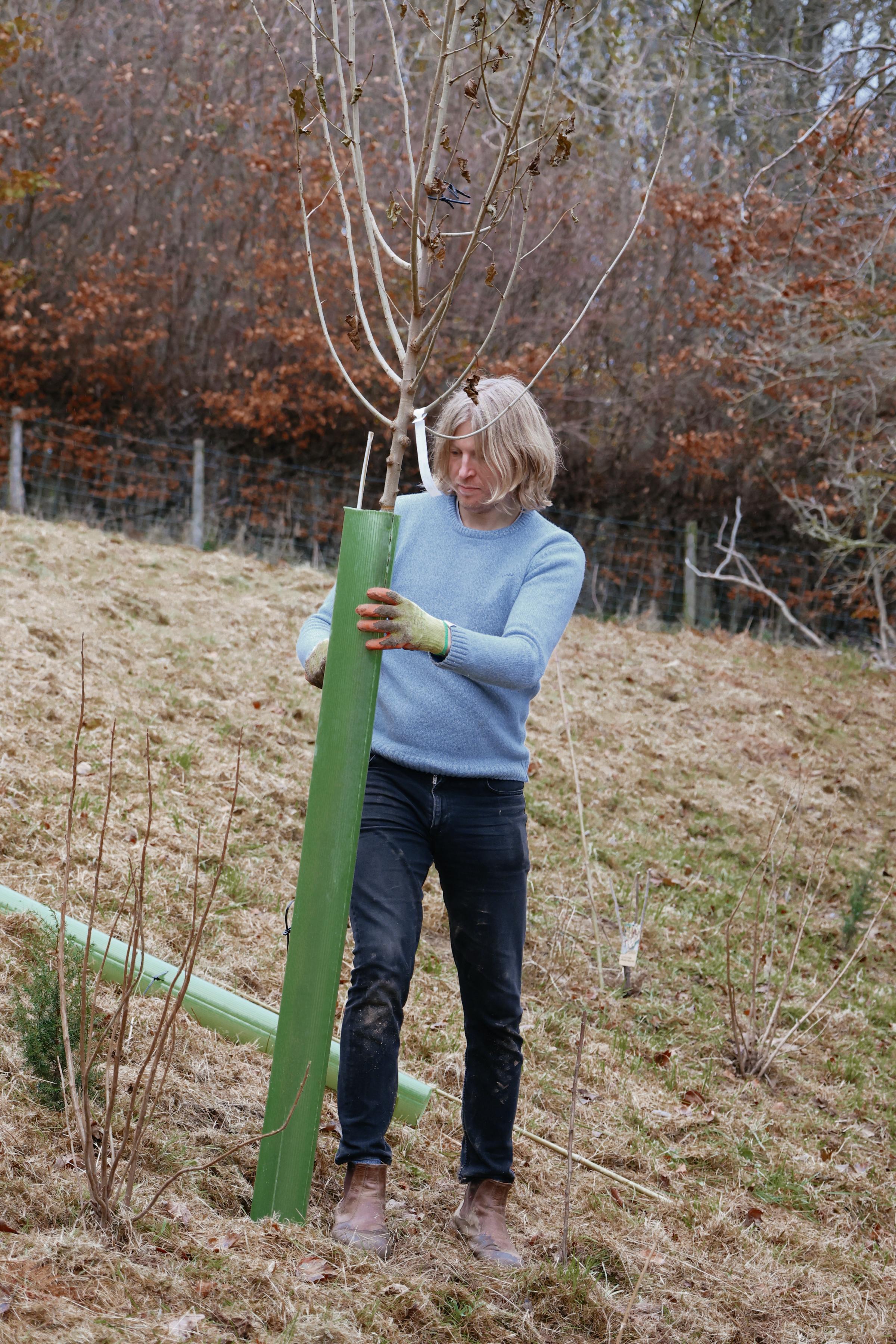 Ollie Hunter plants a tree at Raithwaite Sandsend
