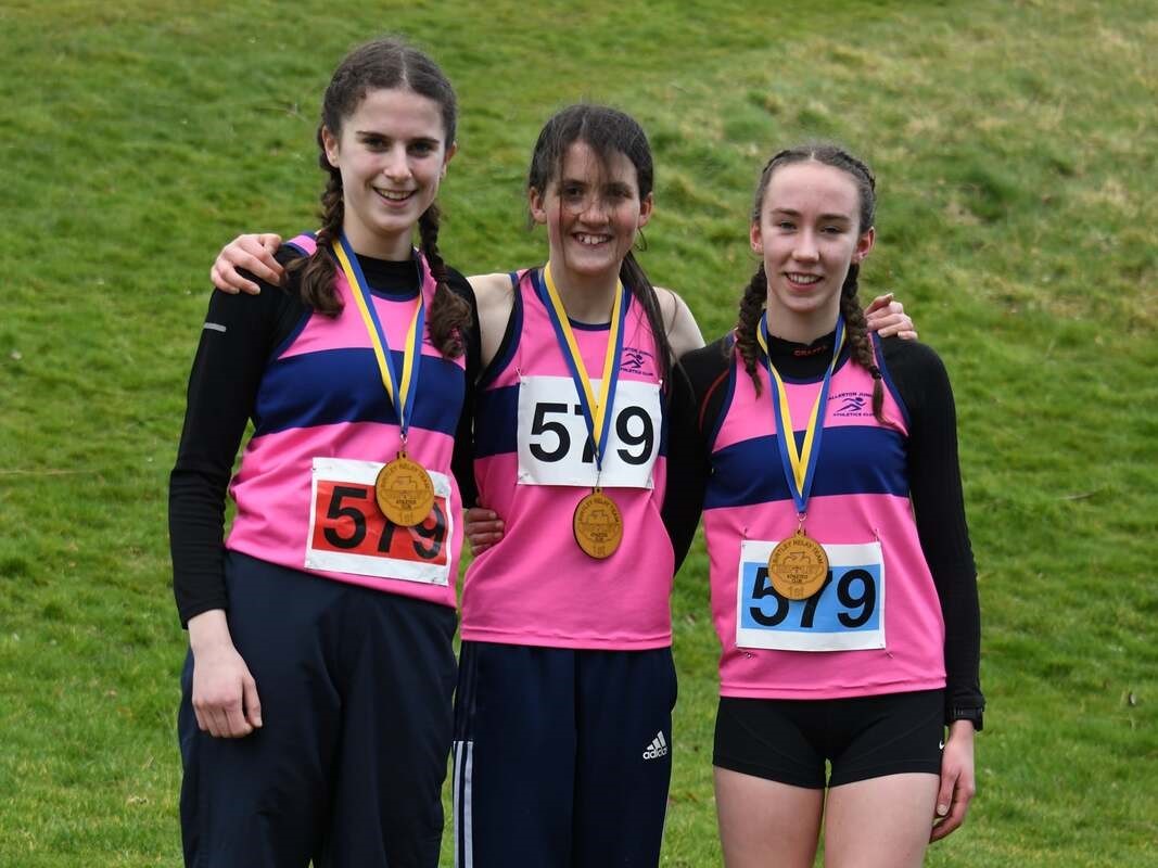 U15 girls, from left, Libby Acton, Grace Derry and Islay Wilson