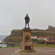 A statue of Captain James Cook stands proudly overlooking Whitby town