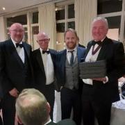 John Simpson, right, presenting the 2020 Charles Amer Salver to the Richmond Golf Club Team of Bruce Tate, Bob Amor and Gary Emmerson (for Ian Allan)