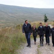 Rishi Sunak with Woodland Trust staff at Snaizeholme, near Hawes, where 250,000 trees are to be planted to help combat global warming