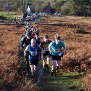 Runners make their way on to the moorland out of Commondale Picture: BRIAN GLEESON