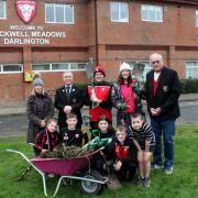 Volunteers Kendra Ullyart, of Friends of the Earth, Darlington RFC club president Andy Gunnell, club captain Darren Hoare, Darlington Forest Project’s Roz Henderson and RFC club chair Tom Miller with youngsters Daisy Anderson, six, Harry Anderson,