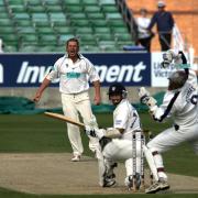 Cricket - Riverside ground, Chester-le-street - Durham (batting) V Hampshire. Hampshire bowler Shane Warne shows his frustration as the ball flys over witcketkeeper Pothas' head. Batsman is Breese

Picture: CHRIS BOOTH