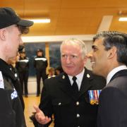 Rishi Sunak and Insp Mark Gee talk to cadet Lewis Normanton of Scorton at the passing out parade event
