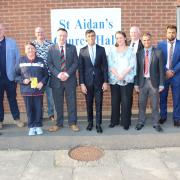 Rishi Sunak with Veterans Information Hub staff and supporters