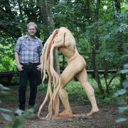 Darlington artist Paul Green with the Back to Our roots sculpture, which has been unveiled at the North York Moors National Park Picture: DAVE CHARNLEY