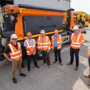 North Yorkshire County Council highways staff with one of the electric-bodied gritters Picture: NYCC