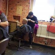 A barber is giving out free haircuts to homeless people to help build their confidence in this North East town over the Christmas period Credit: AL DEVON