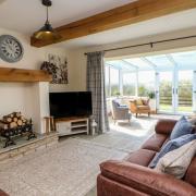Helen and Richard Teward, owners of the West Reins holiday cottage in County Durham, have been recognised in an awards scheme by lettings agency, Sykes Holiday Cottages Credit: SYKES HOLIDAY COTTAGES