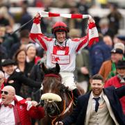 Sam Twiston-Davies celebrates winning the Brown Advisory Novices' Chase aboard The Real Whacker on day two of the Cheltenham Festival at Cheltenham Racecourse Picture: Mike Egerton/PA