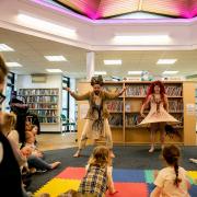 Rapunzel performers showcasing theri family friendly show at the library.