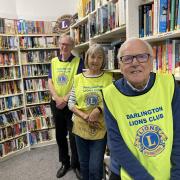 Robert Hillary, Pat De Martino, and Kevin Winkworth at the Darlington Lions Charity Book Shop