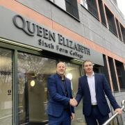 Dean Judson, left, and Tim Fisher shake hands on the plans to merge Queen Elizabeth Sixth Form College with Swift Academies
