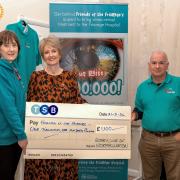 Emma Biggs (centre) presents the cheque to Susan Watson and Dr Anthony Walters, co-chairs of the Friends of the Friarage