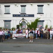 Villagers in Skelton-on-Ure celebrate taking ownership of the Black Lion pub