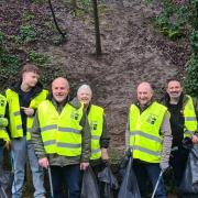 Volunteers from Richmond and District Angling Society litter picking by the River Swale