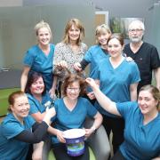 Sarah Robinson, who is to have her head shaved, with colleagues at Leyburn Dental Practice