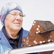 PRIZED PUD: Doreen Haigh with her renowned black pudding which is appearing on upmarket restaurant menus across the North of England. Picture: Richard Doughty