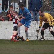 ROUTE BLOCKED: Darlington’s Jordan Robinson and keeper Mark Bell thwart a Radcliffe Borough attack. Picture: Les Hodge