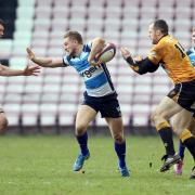 STAY BACK: Mowden's Tom Kill attempts to breakthrough the Esher defence during Mowden's 30-22 win at The Northern Echo Arena on Saturday. Picture: CHRIS BOOTH