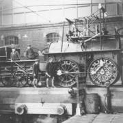 Schoolboys' dream: Locomotion No 1 pictured at Bank Top Station in 1933, with young boys investigating.