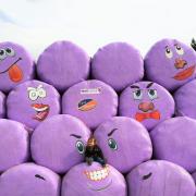 This picture of little Grace Baty sat on her purple monster bales was voted the best.