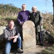 Stonemason, David France, Peter Fall and Dorothy Jane Dale with the newly repaired Murder Stone near Patrick Brompton.  Picture: Richard Doughty Photography