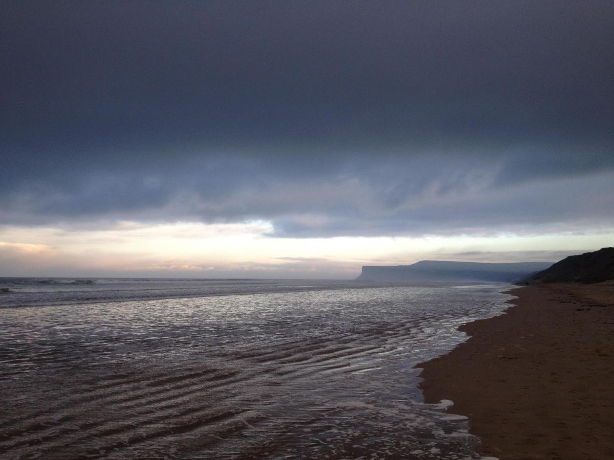 Huntcliff from the beach between Saltburn and Marske on a stormy day, pictured by Andrew Thornton.