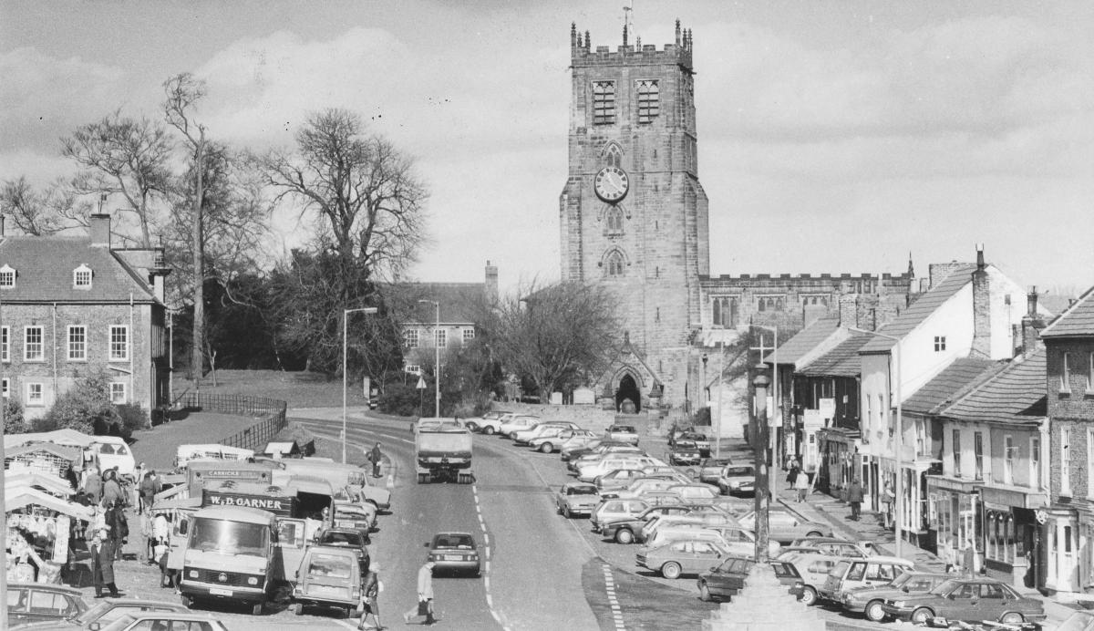 St Gregory's Church towers over Bedale High Street in March 1989