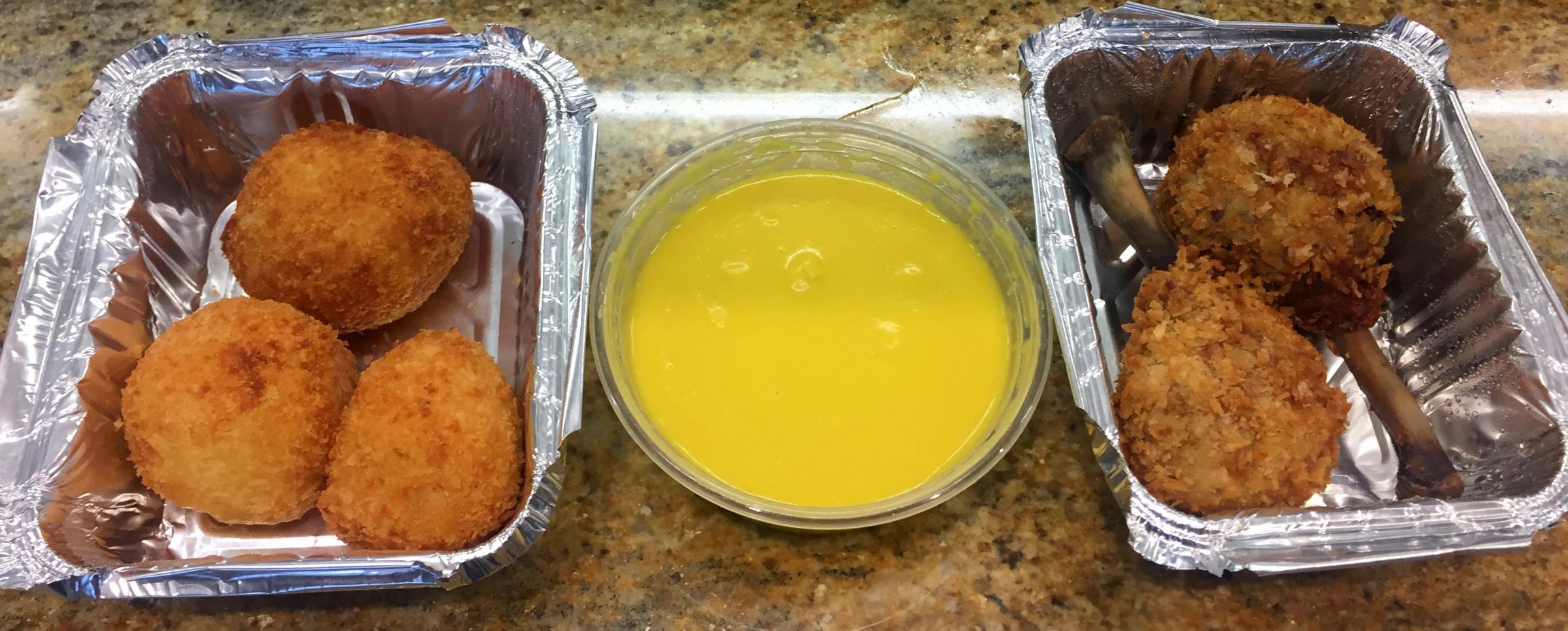 Starters: the Arancini or fried rice balls, on the left, and the crispy chicken drumsticks on the right, plus the sweetcorn puree which only a fool could mistake for custard 