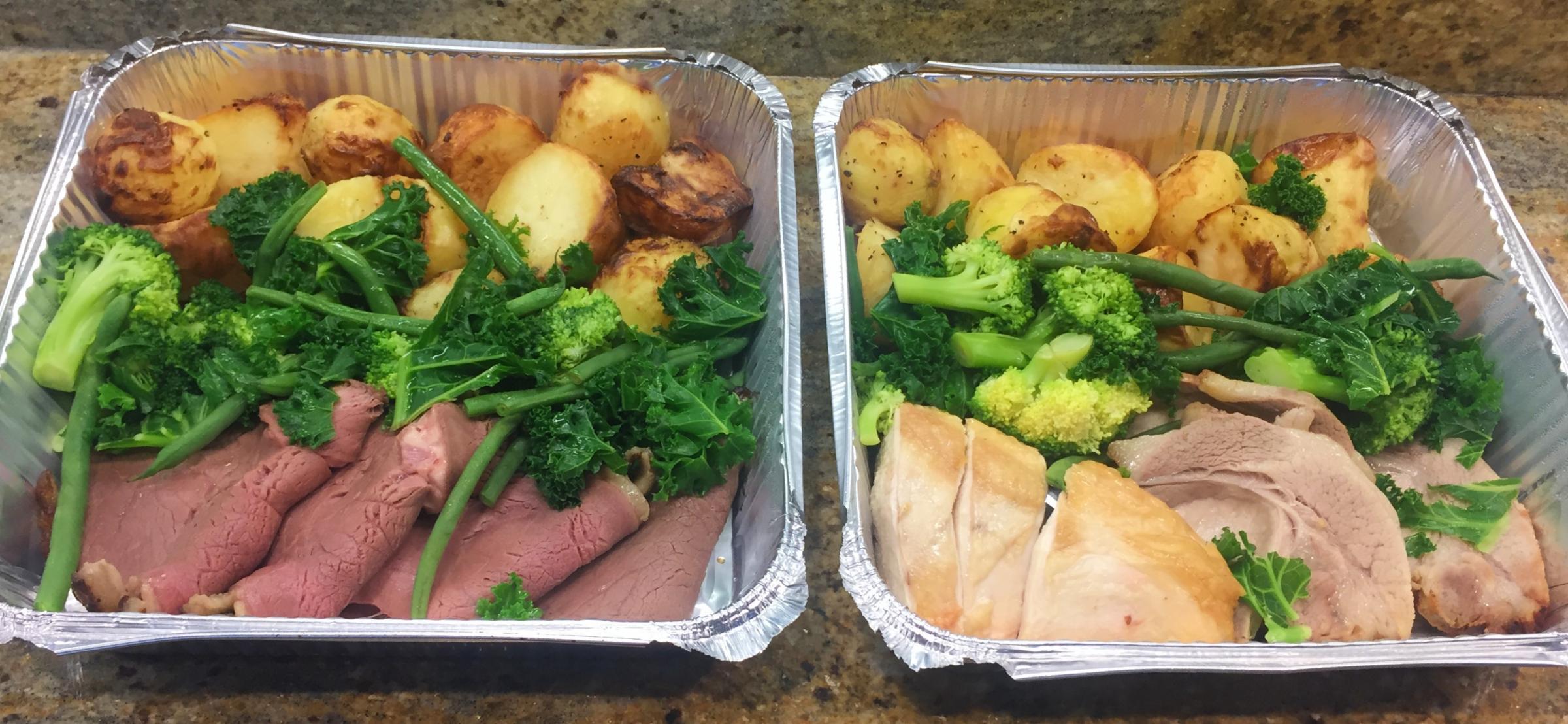 The roast dinners: two beef on the left, and chicken and pork on the right, with plenty of vegetables and potatoes