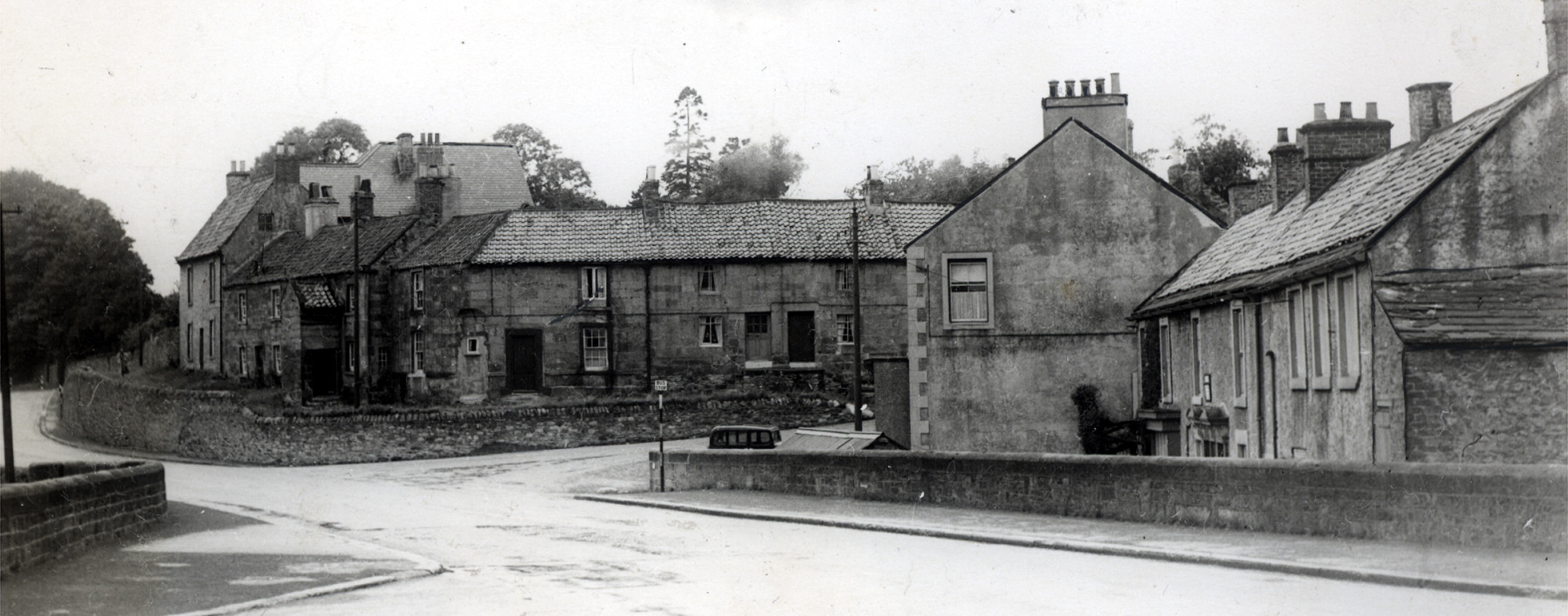 The North Yorkshire village of Barton, near Darlington, in September 1951, with the dovecota very much attached to the terrace of old houses on the left of the picture
