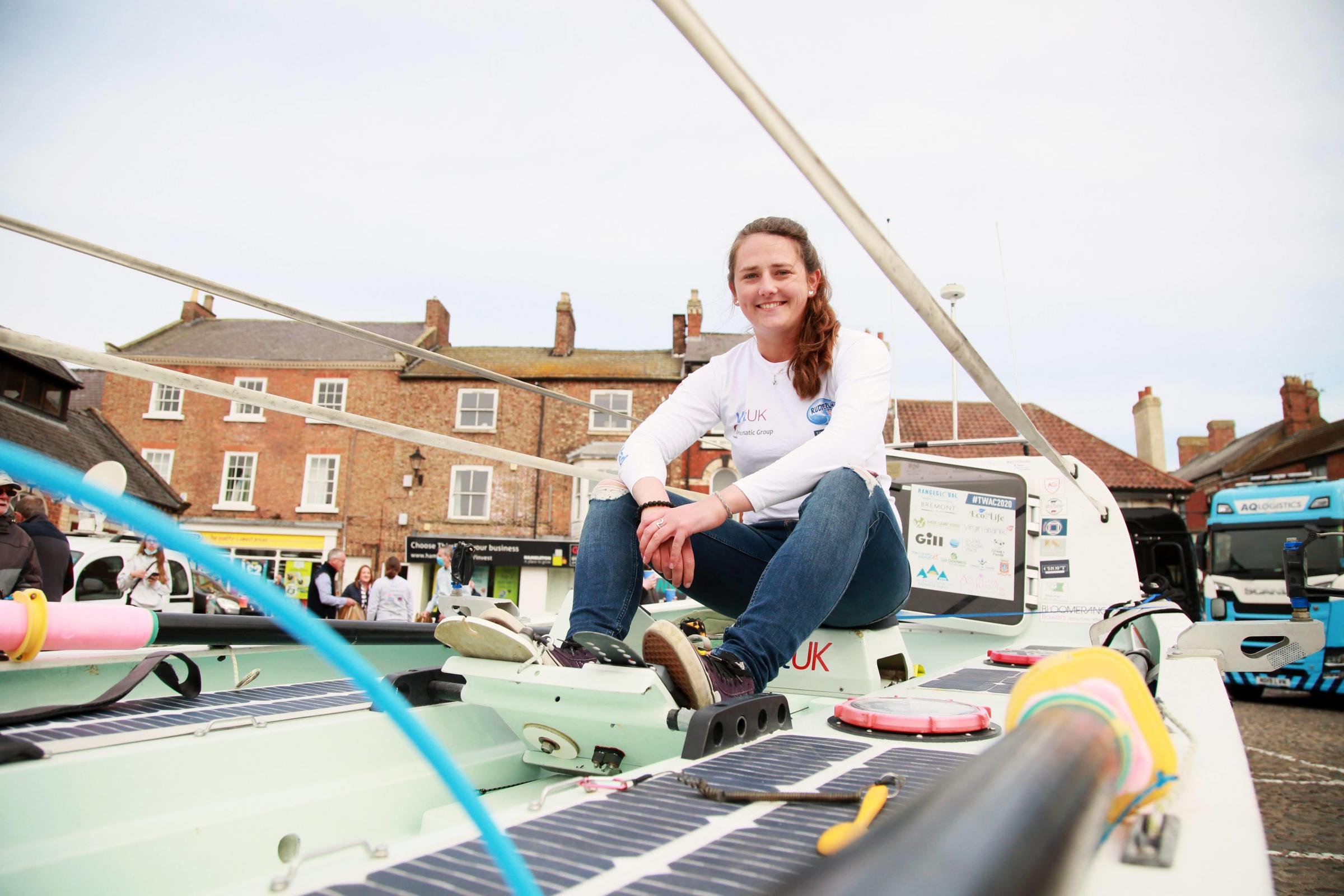 Atlantic Rower Jasmine Harrison with her boat in Thirsk Market Place Picture: SARAH CALDECOTT