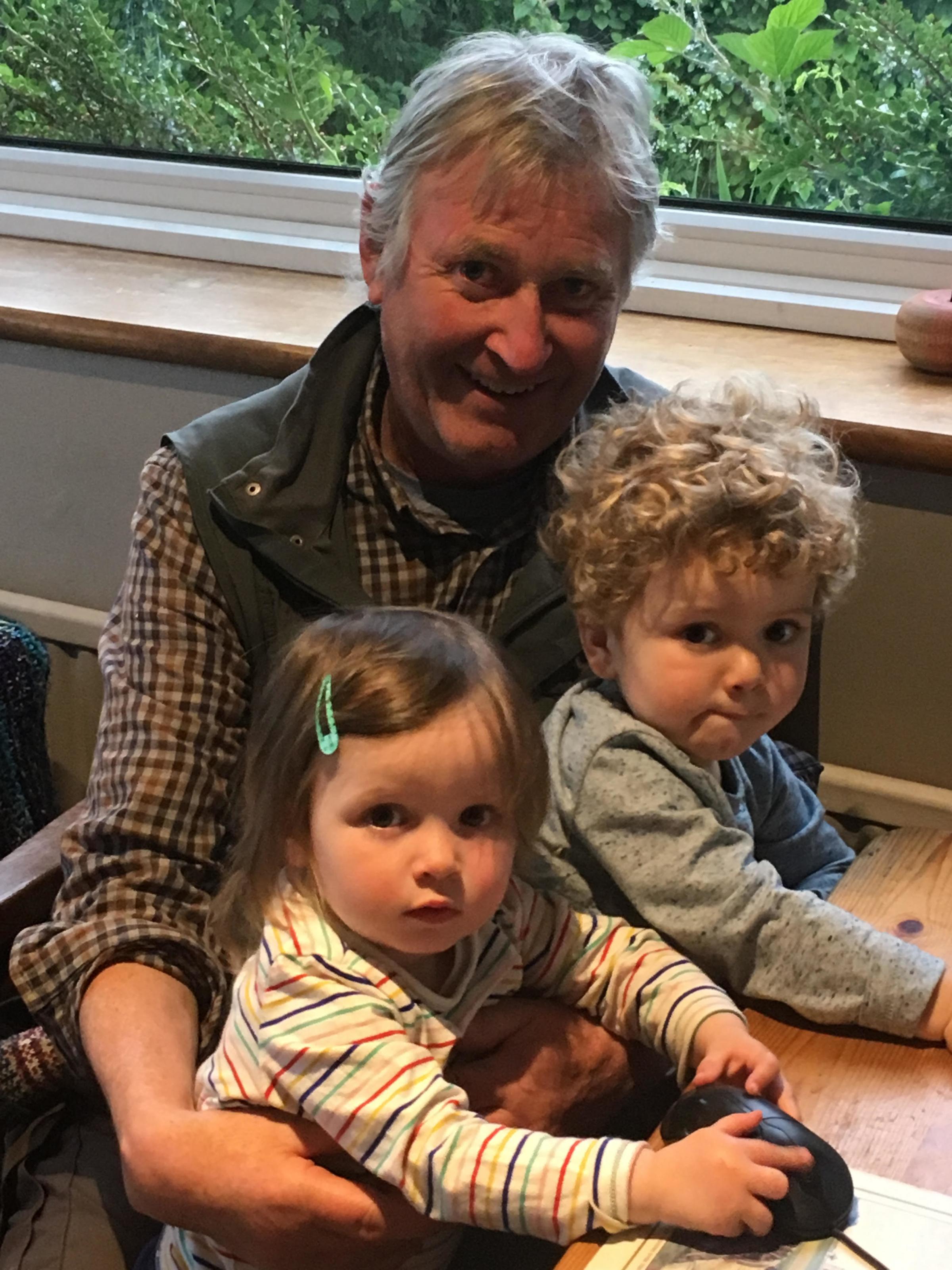 Author John Miles with his two grandchildren