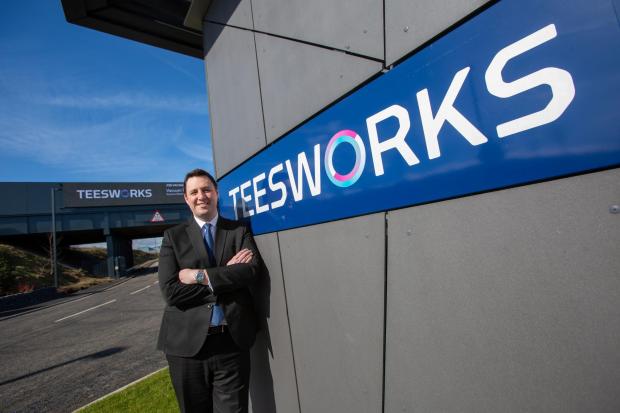 Darlington and Stockton Times: Ben Houchen at the entrance to Teesworks