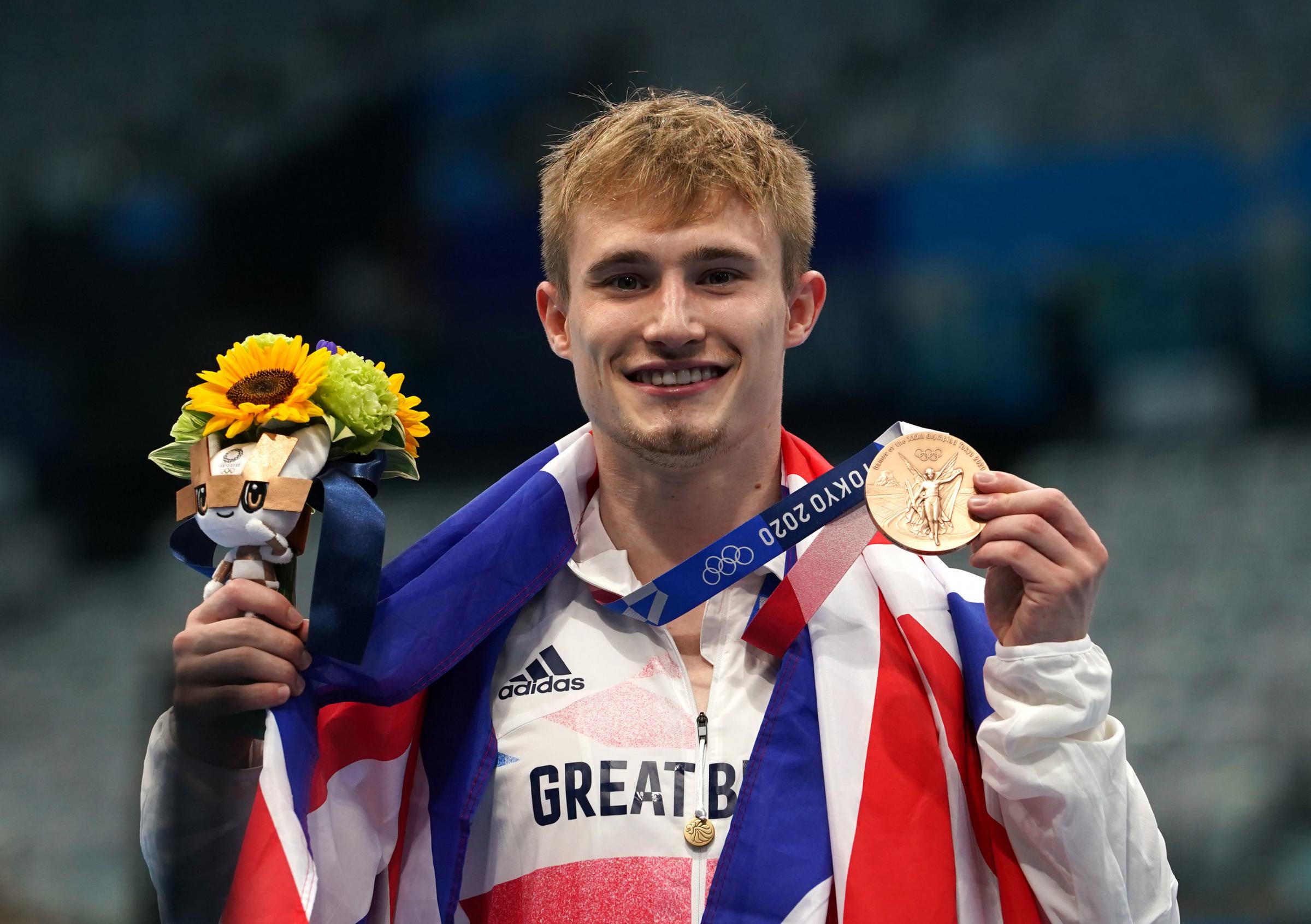 Great Britains Jack Laugher celebrates on the podium with the bronze medal for the Mens 3m Springboard at Tokyo Aquatics Centre on the eleventh day of the Tokyo 2020 Olympic Games in Japan. Picture date: Tuesday August 3, 2021. PA Photo. See PA story
