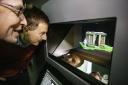 Dominic Lusardi (left) and Tom Mutton (right) viewing one of the holograms at The Moors National Park Centre