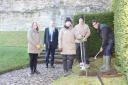 Rishi Sunak planting a tree with the staff of English Heritage at Richmond Castle