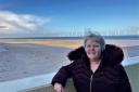 Ruth Fox, chief executive of Footprints in the Community, against the backdrop of the sands at Redcar