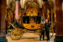 Julie Biddlecombe-Brown,  castle curator, and Nick Ratcliffe, senior guide, with the Raby state coach